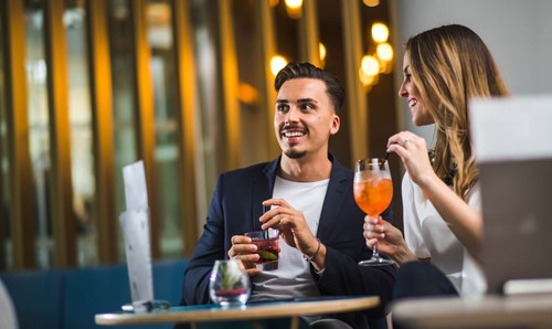 Couple enjoying cocktails at Apex City of Bath Hotel