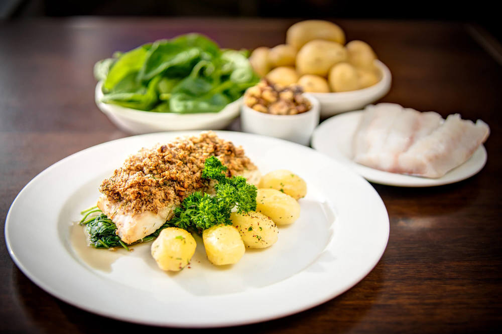 Dining at Metro West End Baked cod with vegetables at Metro West End
