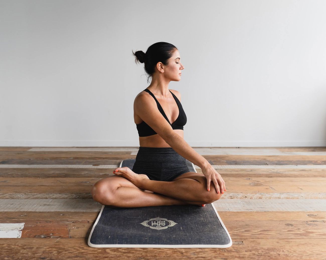 Lady doing Yoga at home