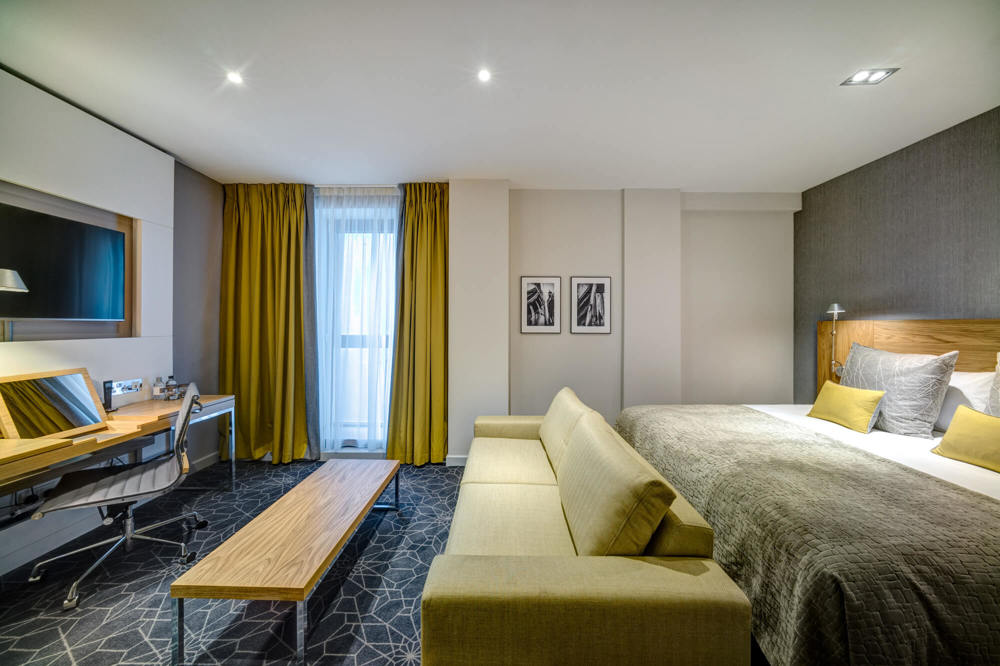 Family Room at Apex City of Glasgow Hotel Family Room with double bed and sofa bed at Apex City of Glasgow Hotel