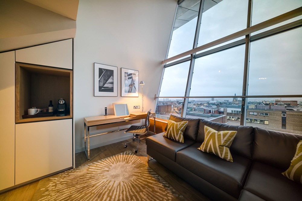 Duplex Suite lounge with daytime city view