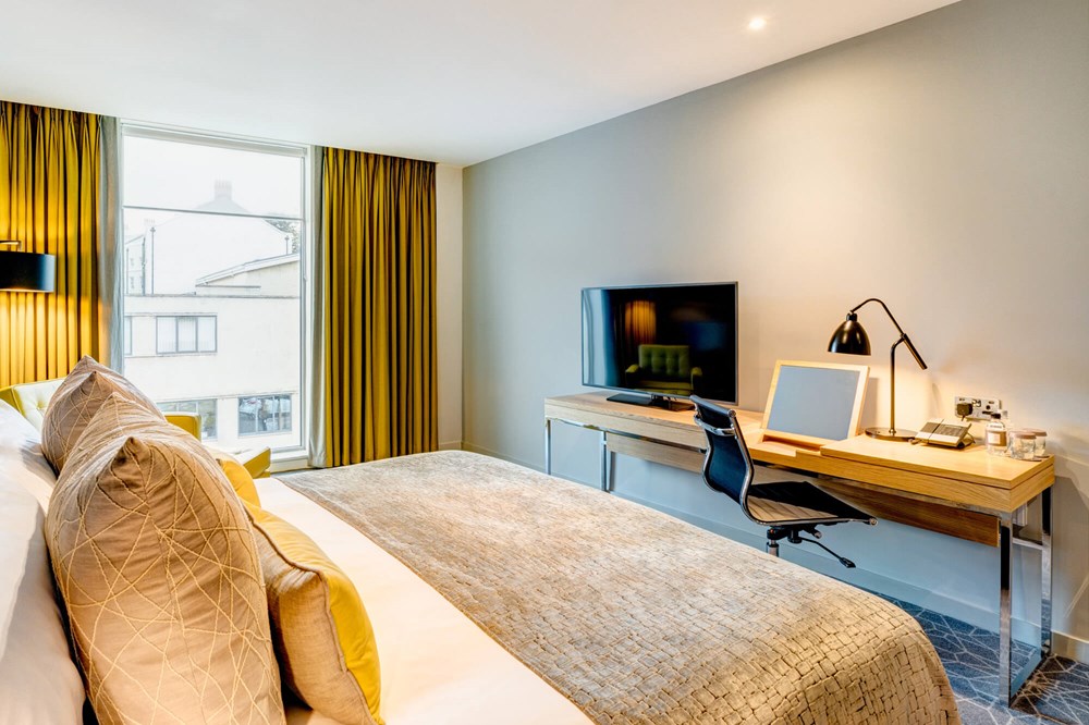 Superior Room with super king-size bed and TV on desk