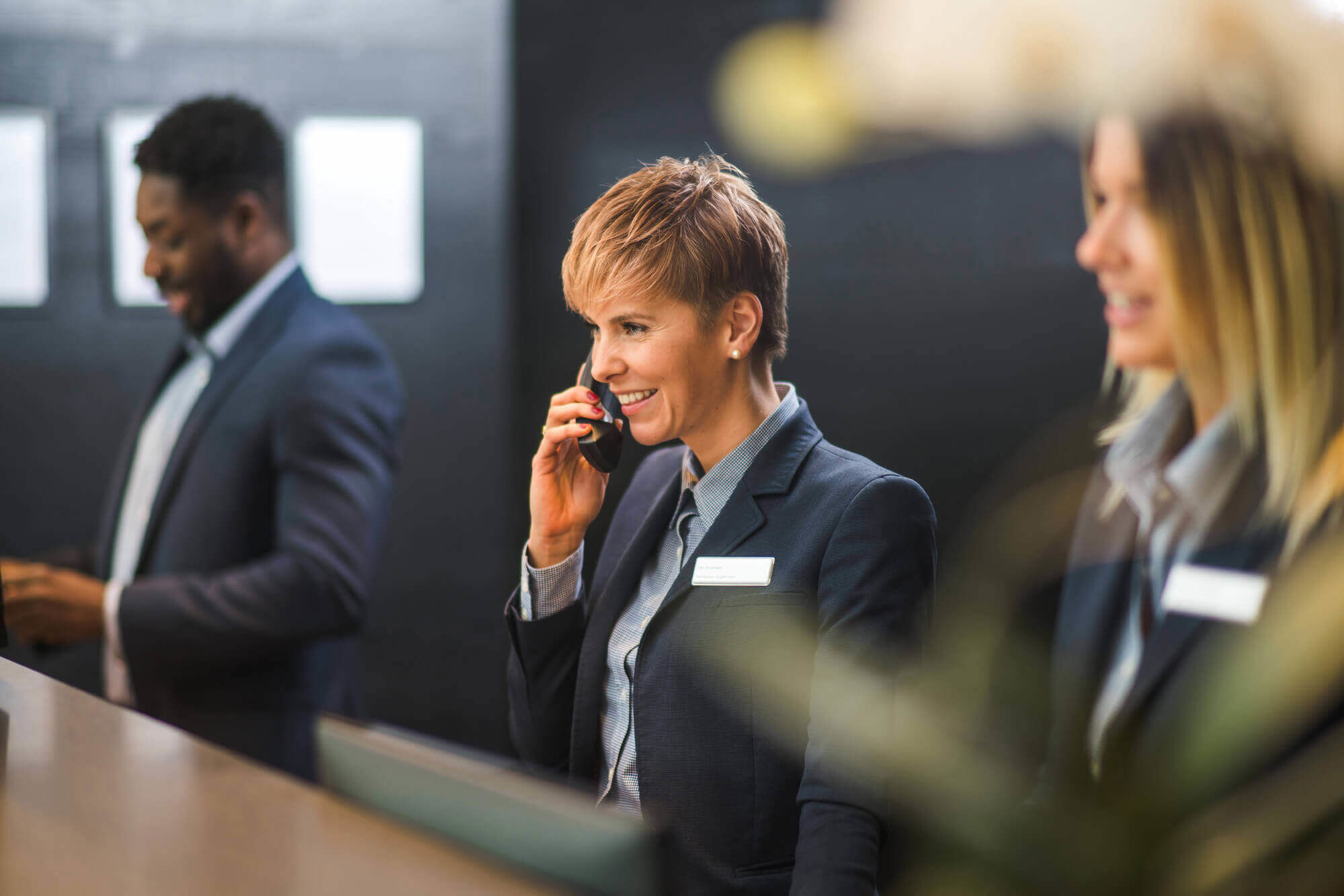 Three staff members on reception