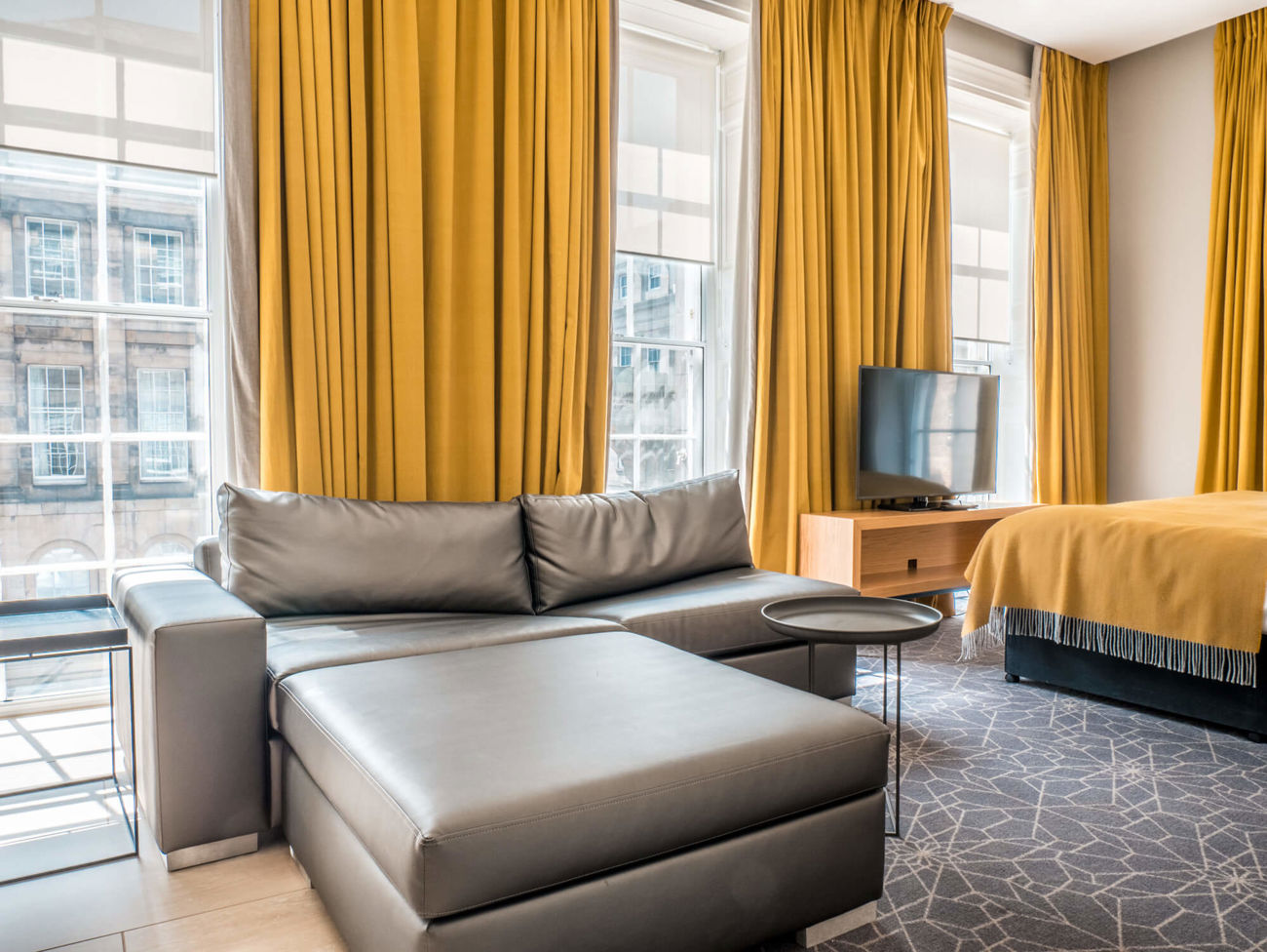 Sofa bed in Family Room at Apex Waterloo Place Hotel