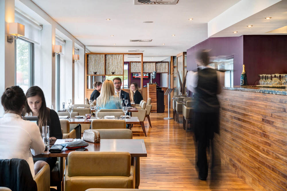Metro West End restaurant with people dining Metro West End restaurant with people dining