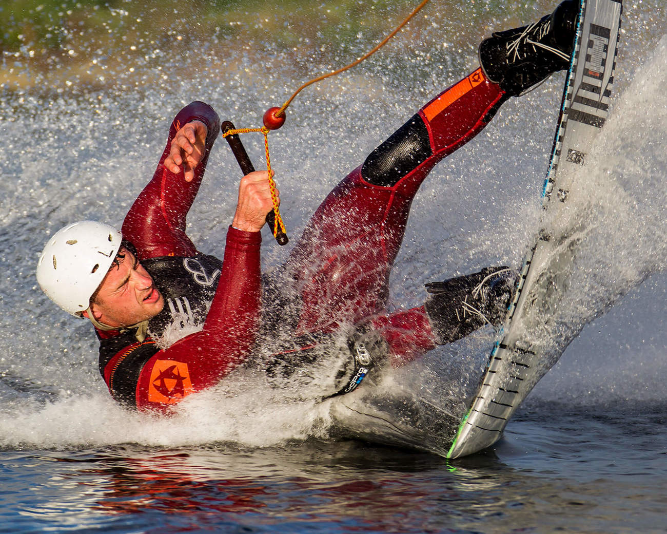 Water sports in Dundee Male water skiing wearing wetsuit