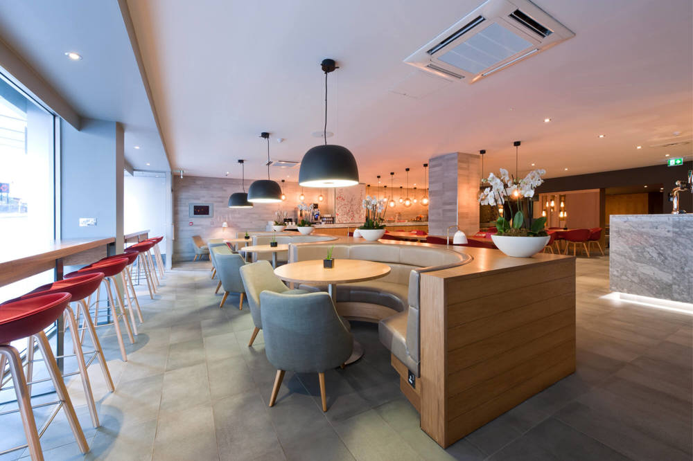 The Lounge at Apex City of Glasgow Hotel The Lounge restaurant with tables and chairs