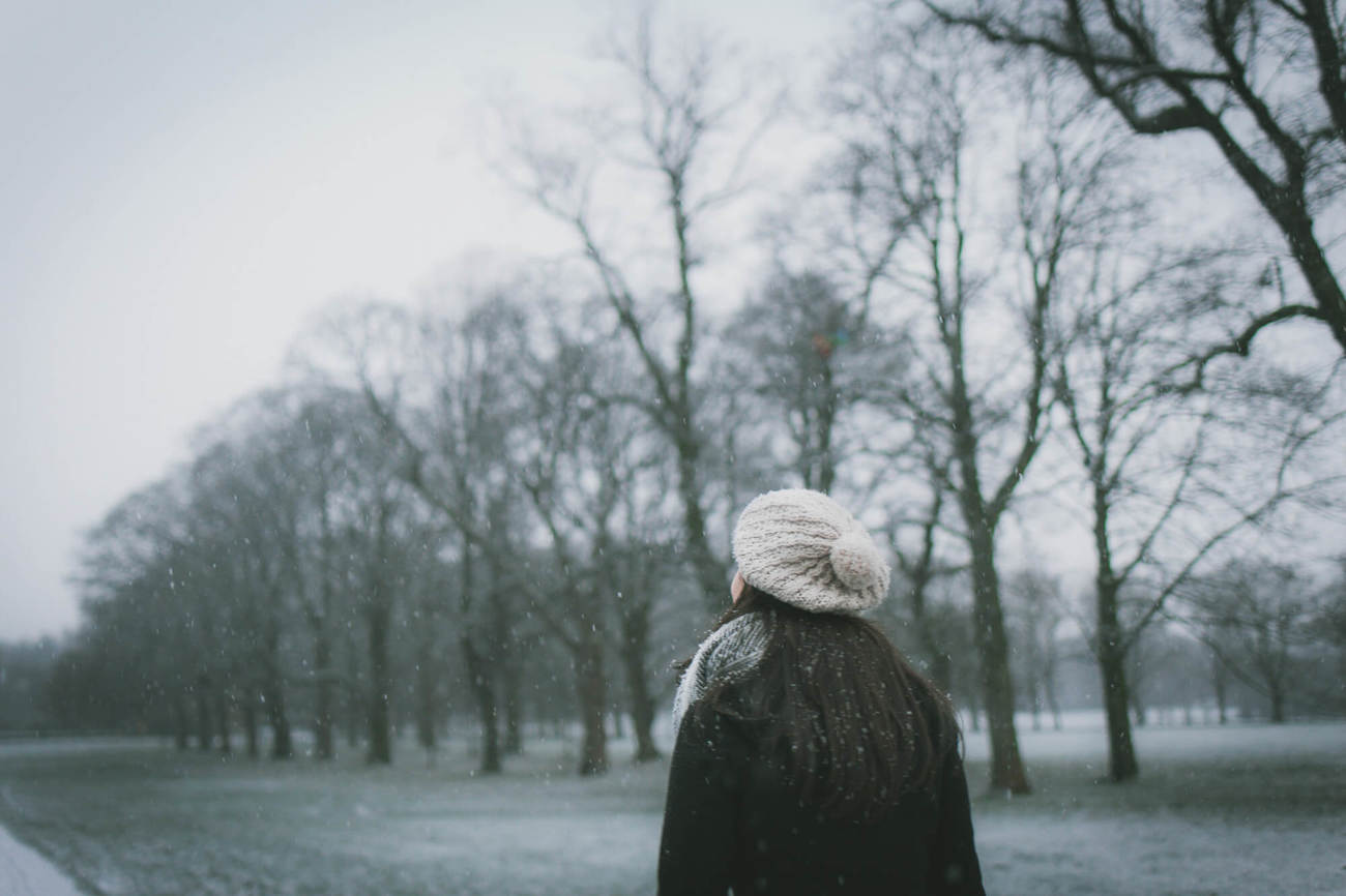 Winter parks in Glasgow Person standing in winter park