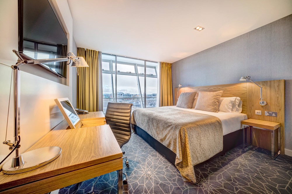 City View Room with king-size bed and desk with TV