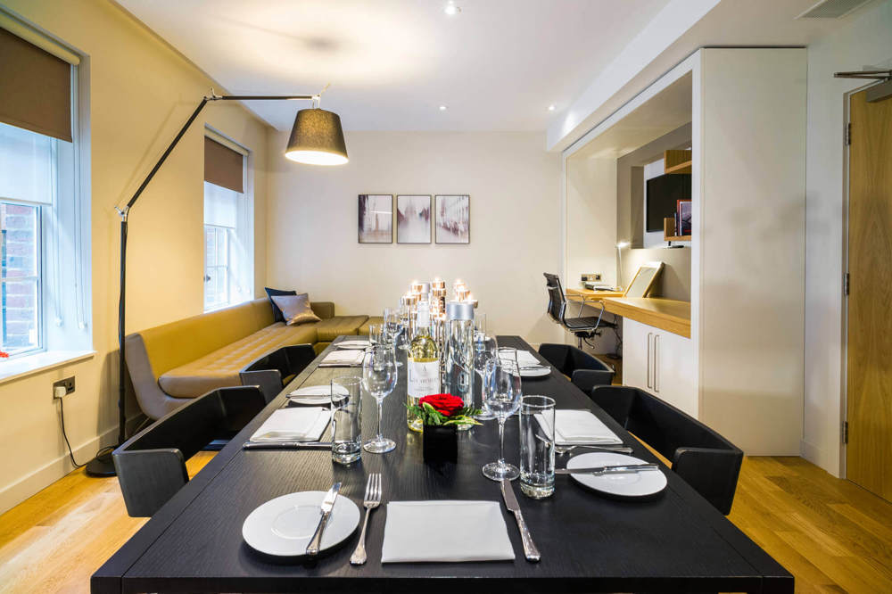 Meeting table set up in Master Suite at Apex Temple Court Hotel