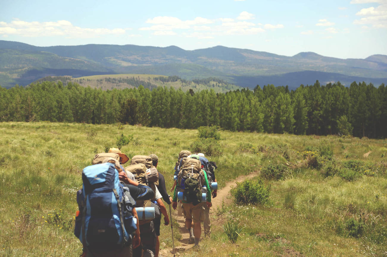 Explore the great Scottish outdoors Group of friends hiking outdoors in Scotland