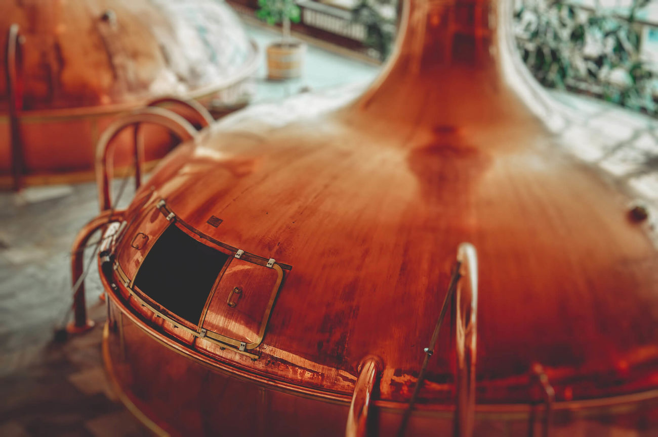 Copper still in distillery