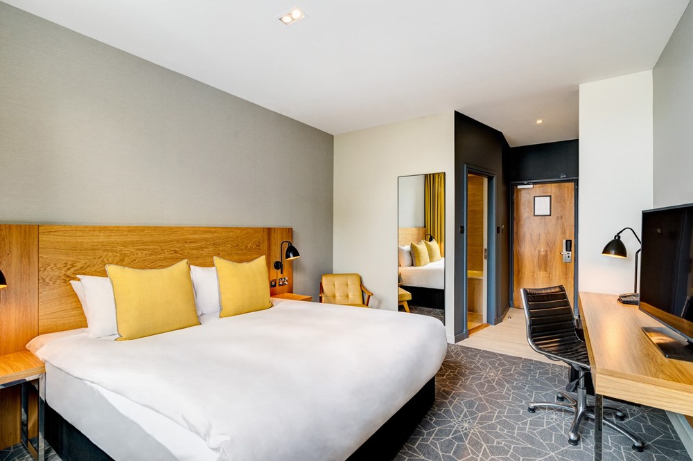 City Room with queen-size bed and desk at Apex Grassmarket Hotel