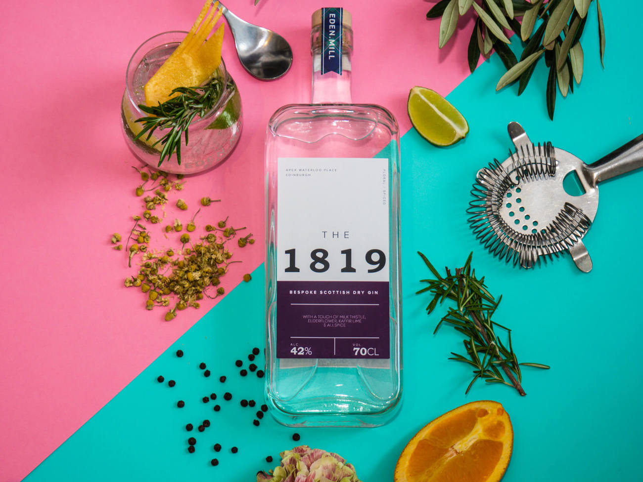 The 1819 gin The 1819 gin on colourful flatlay with botanicals