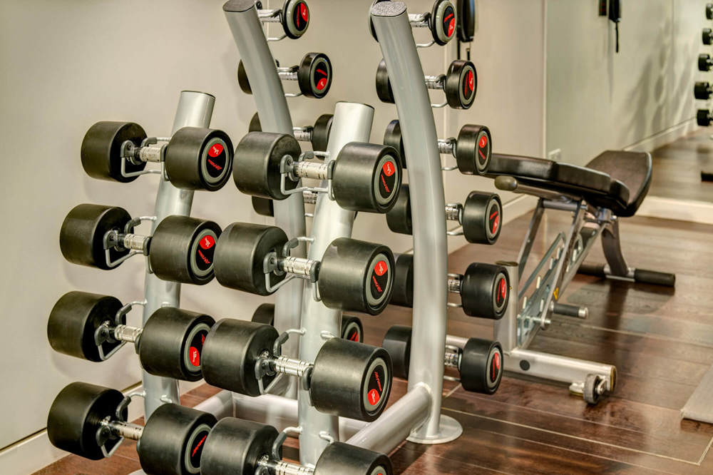 24-hour gym at Apex London Wall Hotel Dumbbells in gym at Apex London Wall Hotel