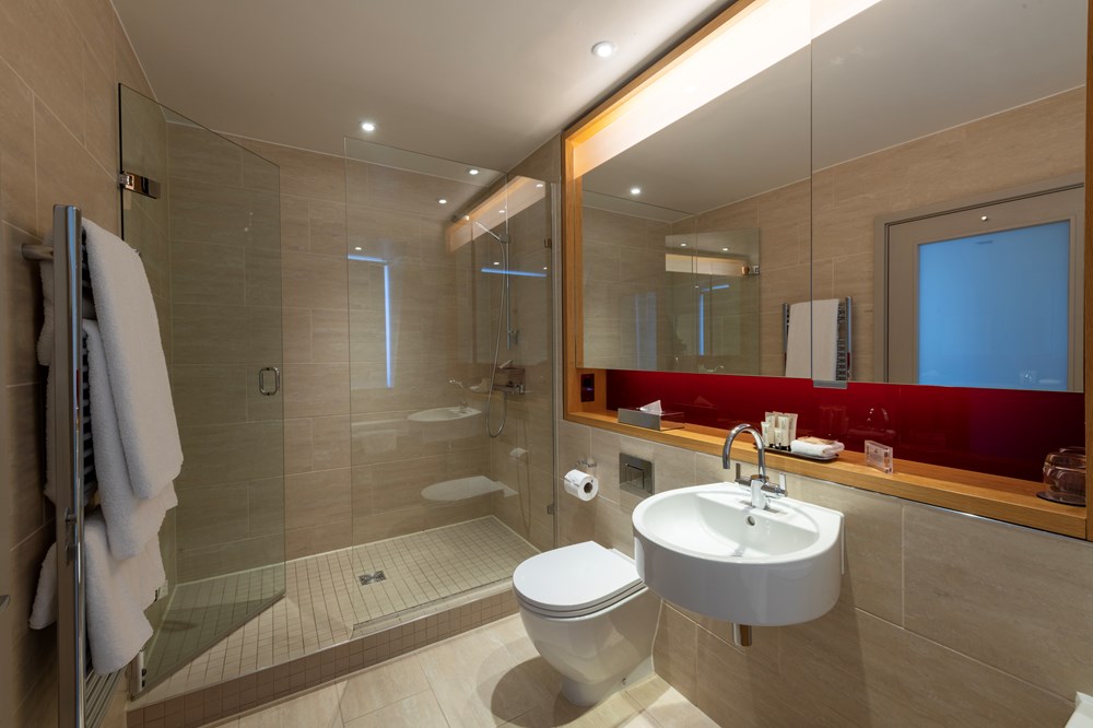 Master Suite bathroom with bath at Apex Temple Court Hotel