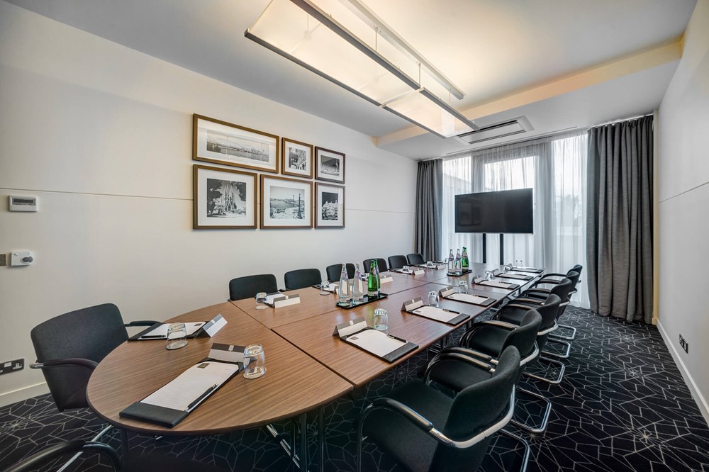 Barcelona room set up boardroom style for meeting
