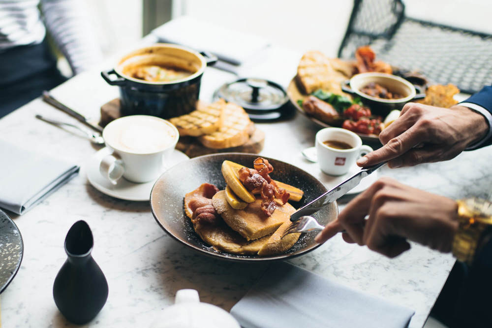 Pancakes and bacon at breakfast Pancakes and bacon at breakfast