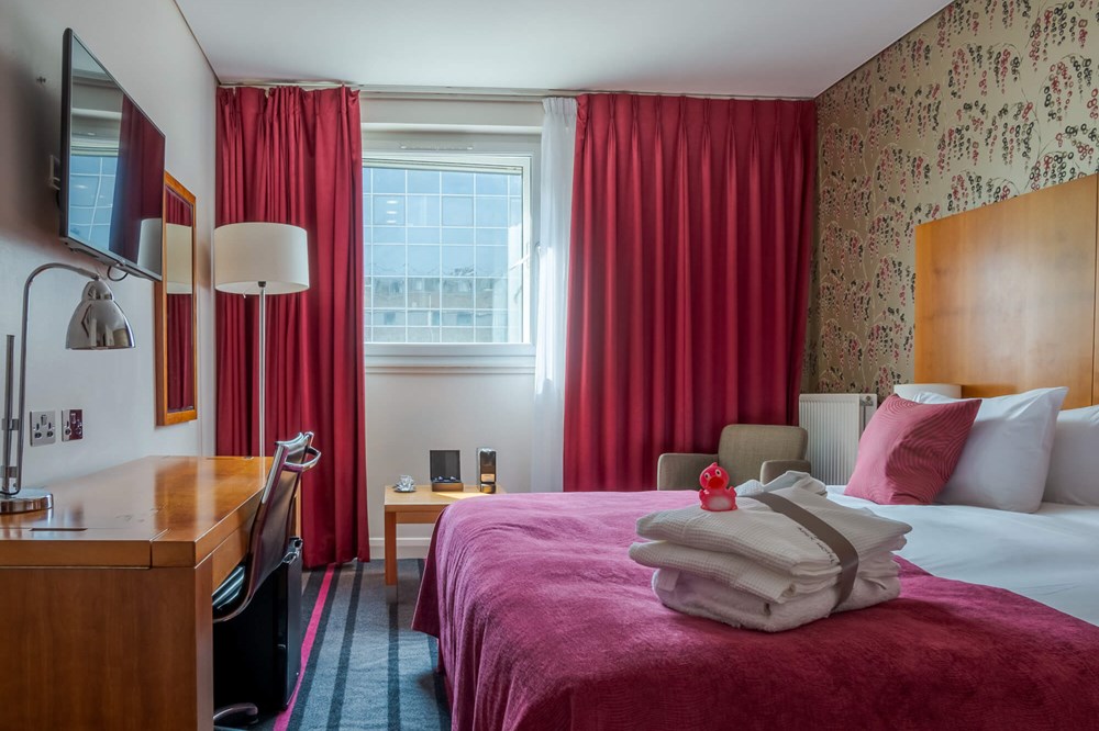 City Plus Room with double bed, robes and desk at Apex Haymarket Hotel