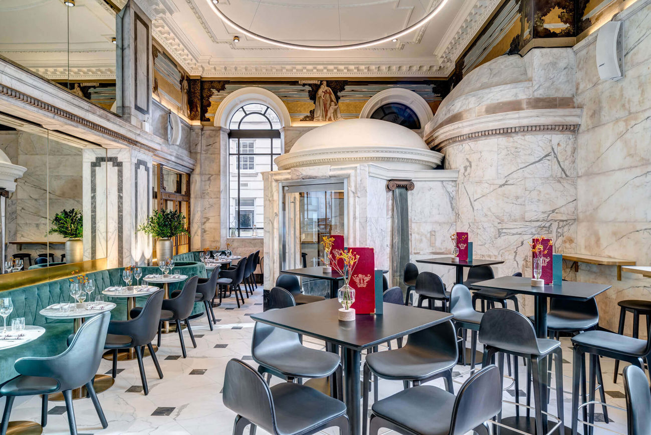 Lazy Ballerinas wine bar with marble decor and velvet seating areas