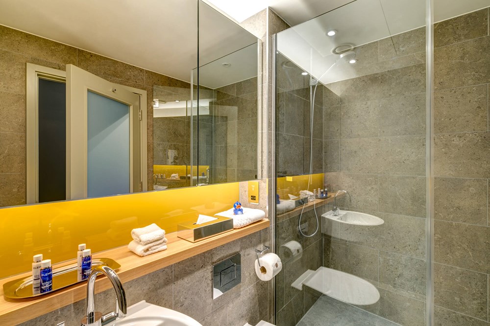 Bathroom with walk-in shower at Apex City of Bath Hotel