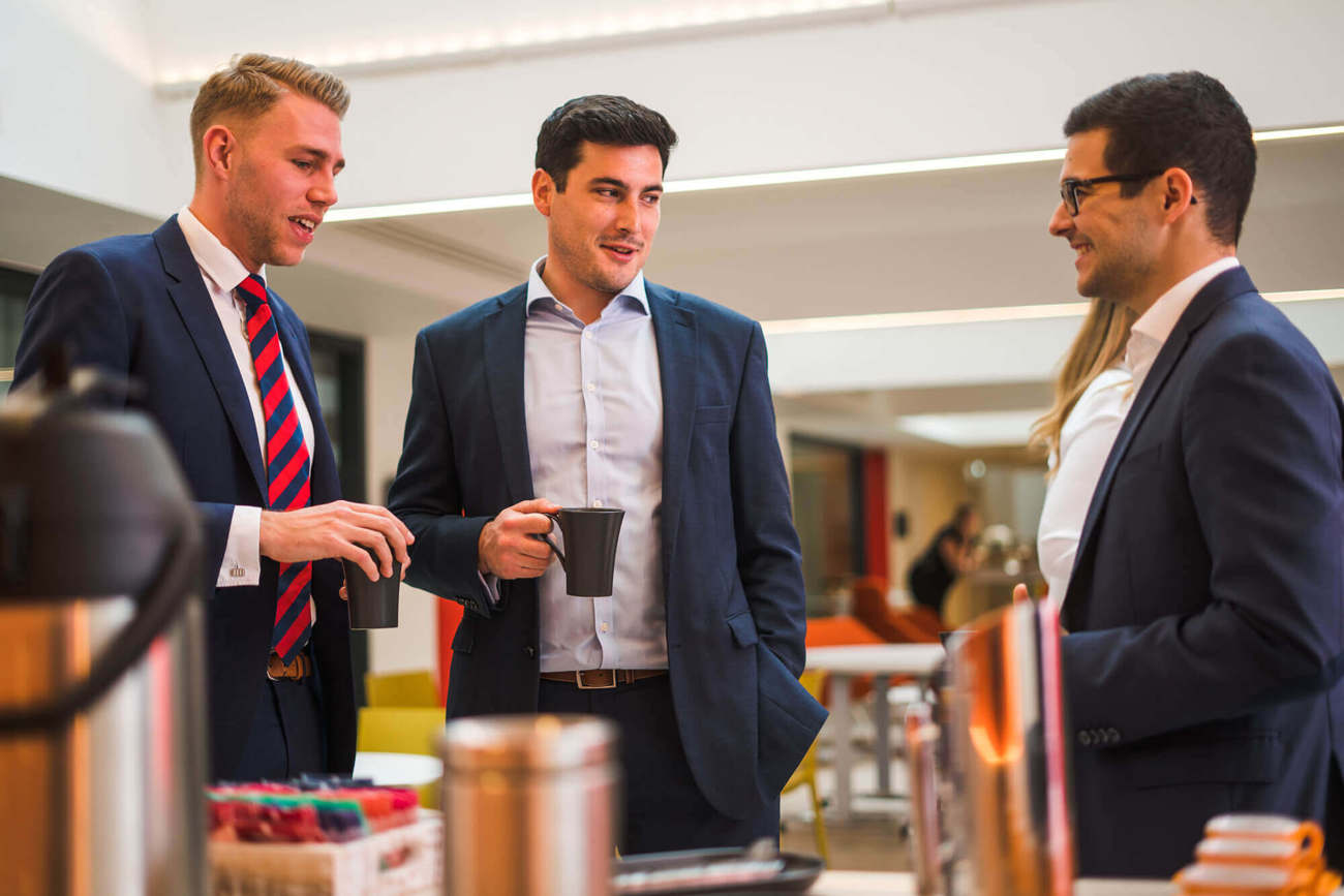 Business travel at Apex Colleagues chatting over coffee at Apex City of Bath Hotel